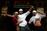 Pizza workers show off
