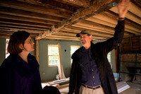 Mike shows Deidre new and old beams at the Monterey Community Center