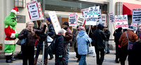 Professional Staff Congress, the union for City University of New York, pickets on behalf of their Research Foundation workers in front of the building where the Board of Directors is meeting on Dec.
