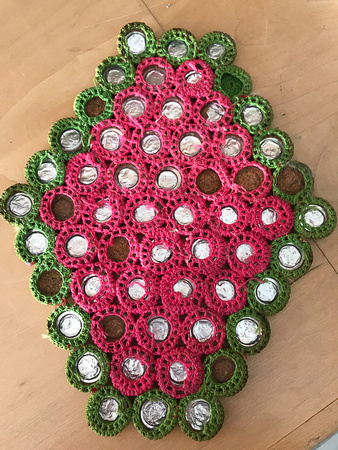 Crochet trivet, bottle cap base (underneath view)